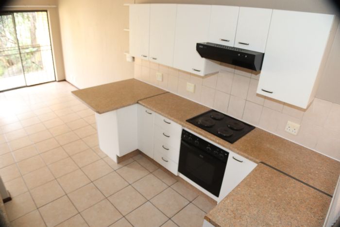 For Sale: Apartment in Paulshof with garden, open plan living, and parking.