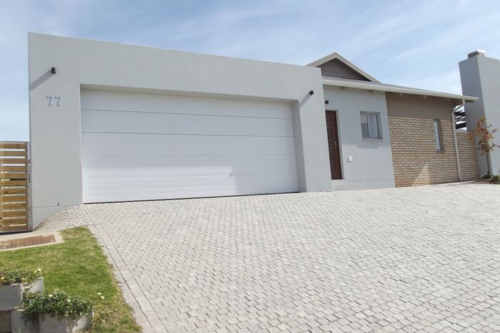 For Sale: 3-Bedroom House in Mooikloof Country Estate with Double Garage and Braai Area.