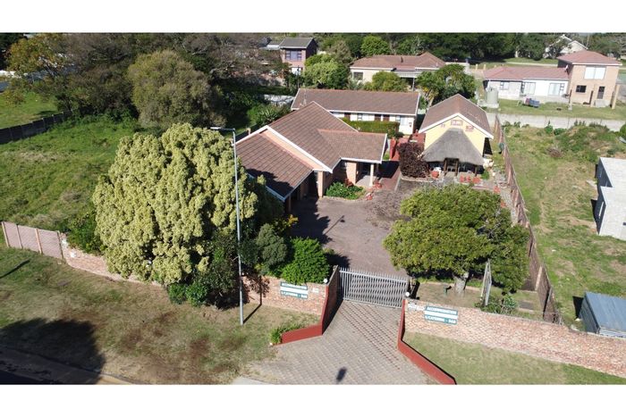 For Sale: East Bank House with 9 bedrooms, guest wings, and income potential.