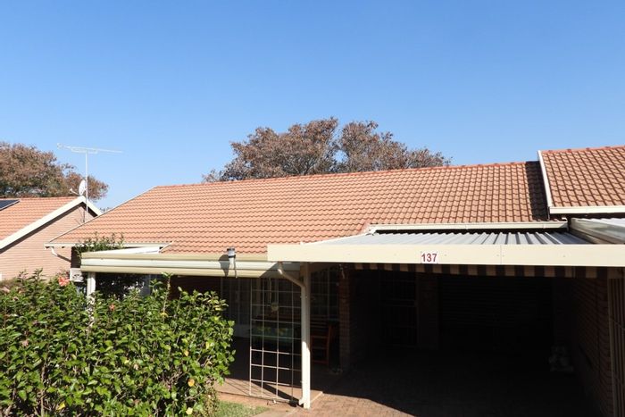 For Sale: Townhouse in Bela Bela Central with garden, solar power, and security.
