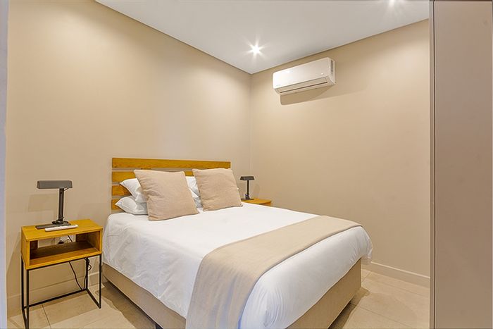 1-Bedroom Apartment To Rent in Sandton Central with pool, gym, and dining options.