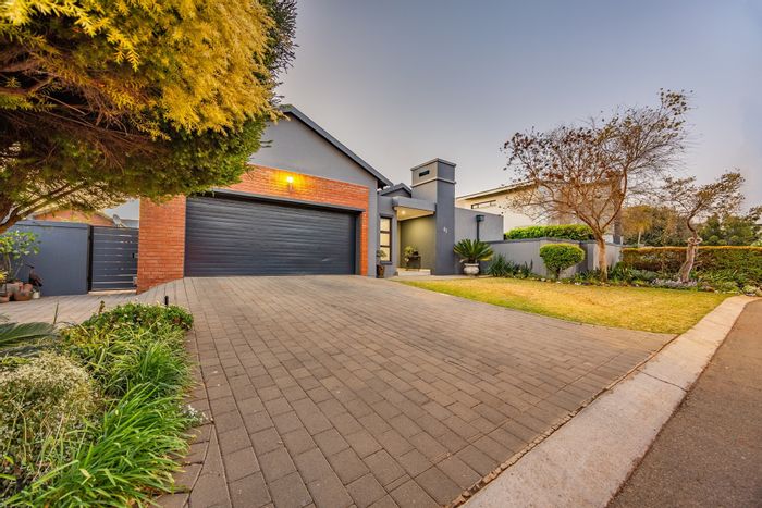 For Sale: House in Midstream Estate with solar system, indoor braai, and garden.