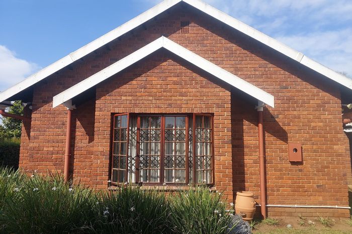 3-Bedroom Townhouse To Rent in Scottsville with garden, garage, and prime location.