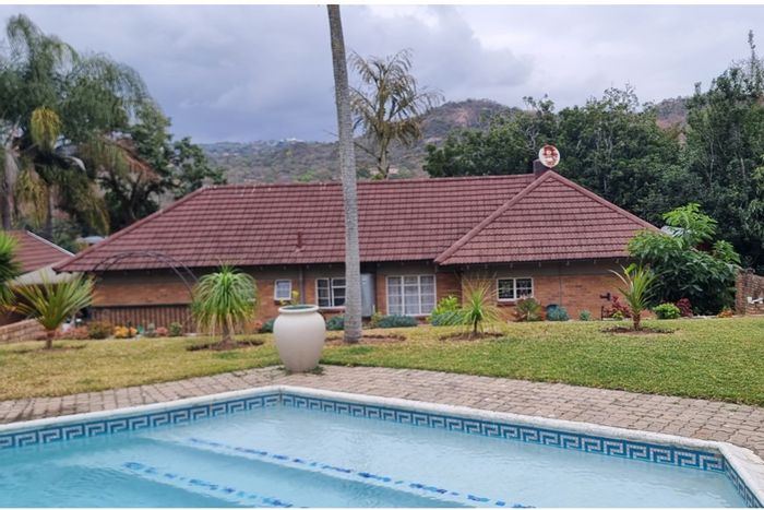 House for Sale in Nelspruit Ext 5: Spacious living, ample parking, potential income.