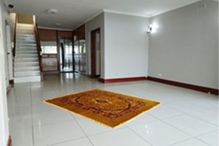 3-Bedroom Townhouse in Sparks Estate To Rent with pool, garage, and balcony.