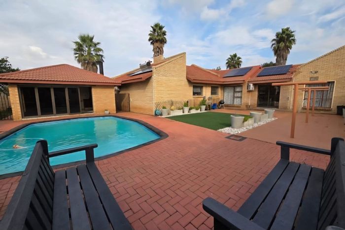 4-Bedroom House For Sale in Vanderbijlpark SE with pool, garage, and security features.