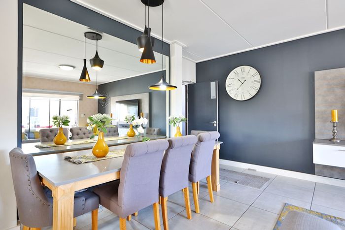 For Sale: Waterfall Apartment with lifestyle center access, gas braai, and two parking bays.