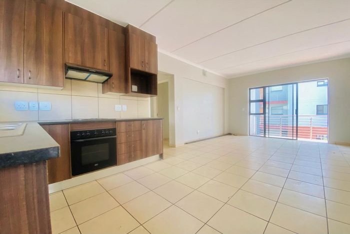 For Sale: 2-Bedroom Townhouse in Barbeque Downs with pool and kids' play area.