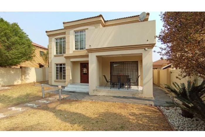 For Sale: House in Amberfield Heights with guest toilet, patio, and large yard.