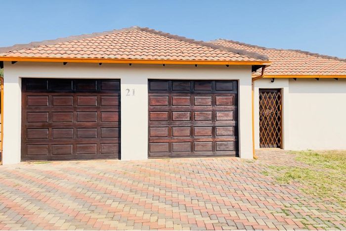 House For Sale in The Orchards: 3 beds, renovated kitchen, spacious yard, double garage.