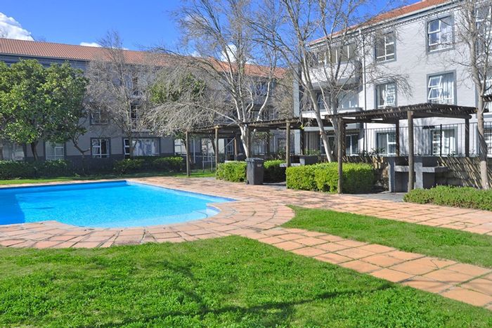 2-Bedroom Apartment in Pinelands To Rent with communal pool, gym, and parking.