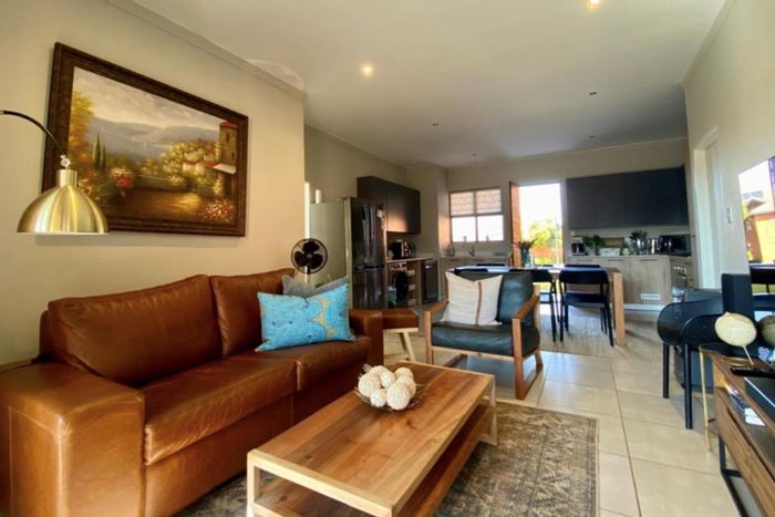 2-Bed Apartment To Rent in Rietvalleirand with secure parking and private garden.