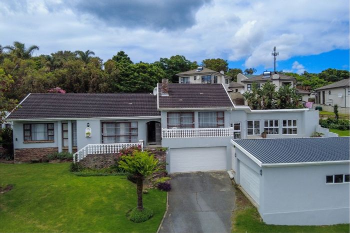 For Sale: Beacon Bay house with pool, indoor entertainment area, and ample parking.