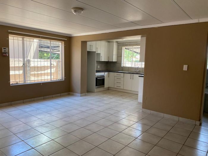 2-Bedroom House To Rent in Brakpan Central with pet-friendly garden and carport.