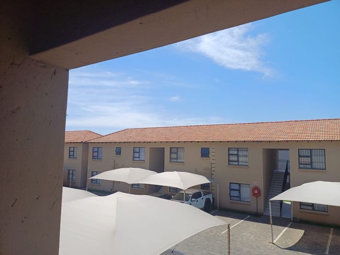 2-Bedroom Flat For Sale in Brakpan North with secure parking and open-plan living.