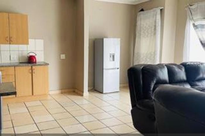 For Sale: 2-Bedroom Apartment in Brakpan Central with secure parking and amenities.