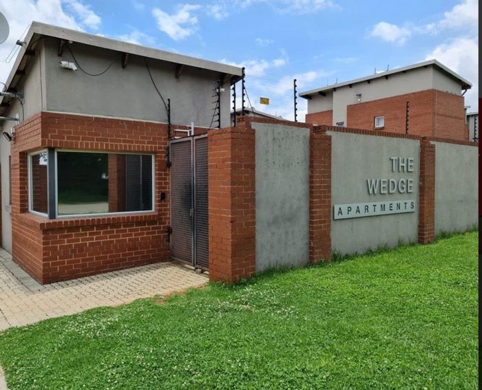 For Sale: 2-bedroom apartment in Esther Park with balcony and covered parking.