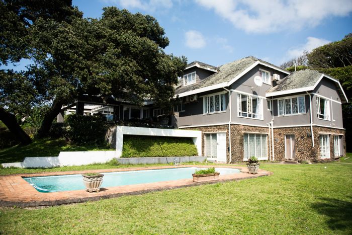 Umtentweni House For Sale: Seafront, pool, multiple living areas, and potential flatlets.
