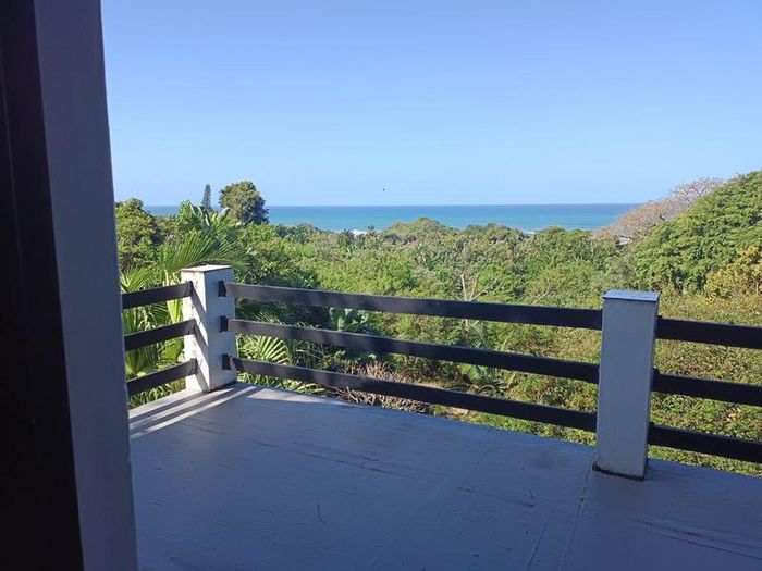House for Sale in Trafalgar: Ocean views, cottage, double garage, and spacious living.