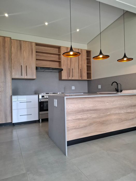 For Sale: House in Helderzicht Eco Estate with 3 bedrooms, solar panels, and braai.