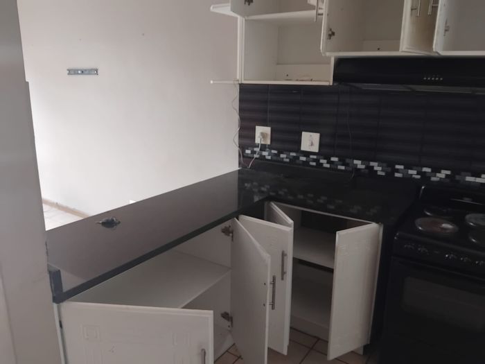 For Sale: 2-Bedroom Apartment in Prestbury, secure complex near schools and malls.