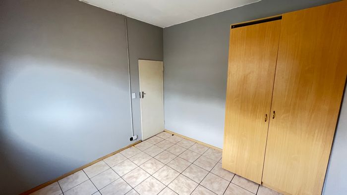 Ground floor apartment in Rynfield with pool, braai area, and 24/7 security.