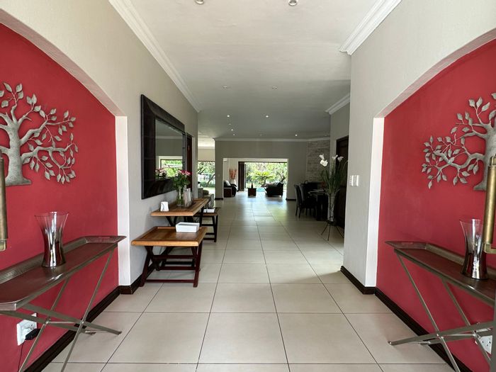 For Sale: House in Blue Valley Golf Estate with pool, bar, and solar power.