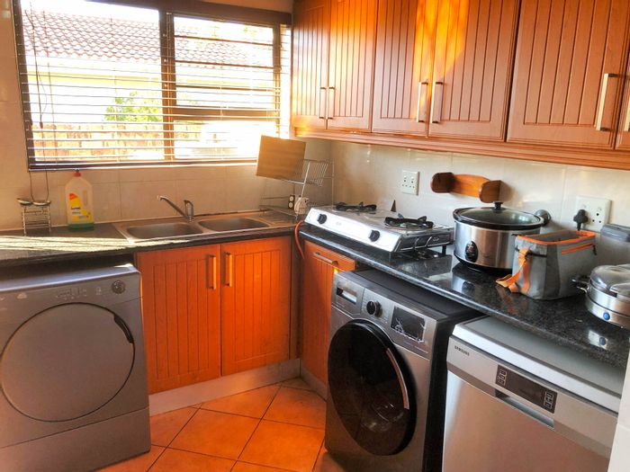 3-Bedroom Townhouse For Sale in Uvongo with double garage and outdoor patio.