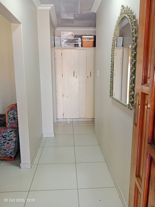 Dual homes with rental potential, large parking, and expansive land in Mountain Rise. For Sale.