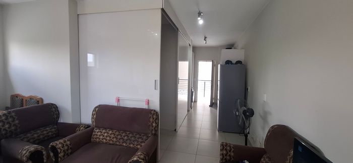 1-Bedroom Apartment For Sale in North Riding with balcony, parking, and security.