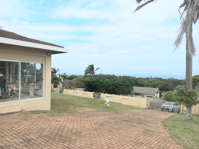 For Sale: Uvongo House with sea views, pool, entertainment area, and security features.