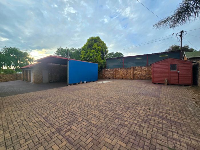 For Sale: House in Dennesig with multiple flats, garages, and rental income potential.