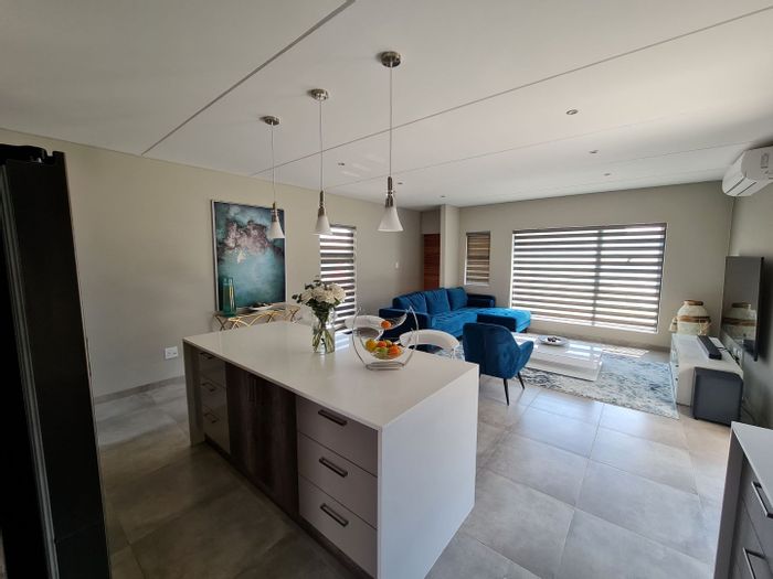 For Sale: Townhouse in Langenhovenpark with security, spacious units, and convenient amenities.