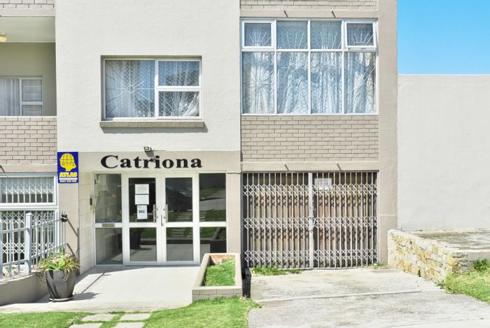 Furnished 2-bedroom apartment in Humewood, steps from the beach, for sale.