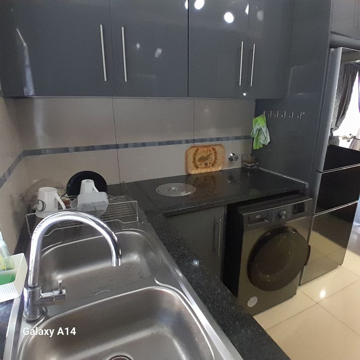 Buccleuch Townhouse For Sale: 2 beds, pool, security, courtyard, extra room.