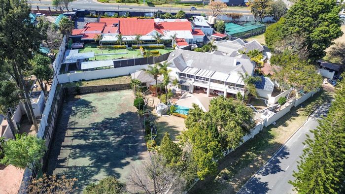 For Sale: Spacious Bryanston House with 6 Bedrooms, Tennis Court, Heated Pool.