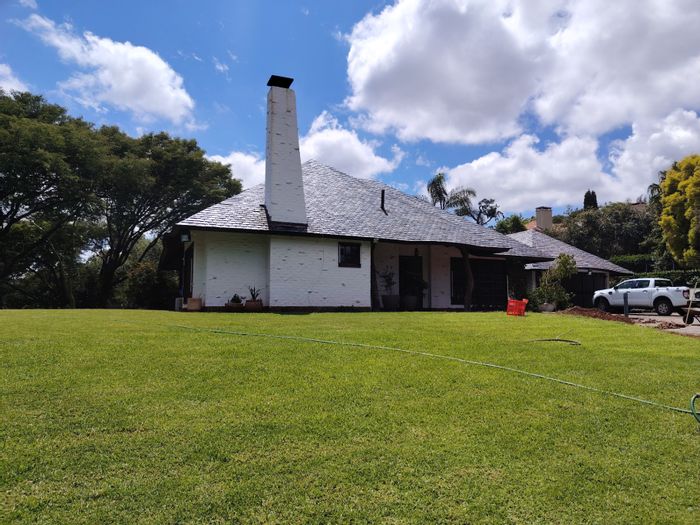 For Sale: House in Waterkloof Heights with pool, expansive garden, and study.