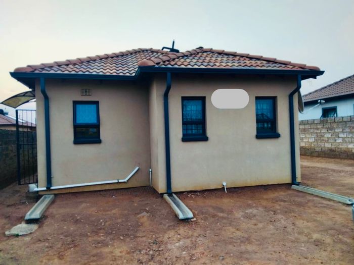 For Sale: 2-Bedroom House in Protea Glen with secure parking and easy freeway access.