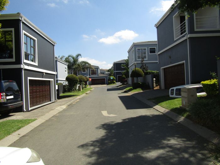 For Sale: Cluster in Carlswald with 3 beds, double garage, and private garden.