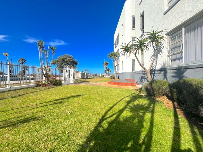 Spacious 3-bedroom apartment in Summerstrand, steps from the beachfront, for sale.