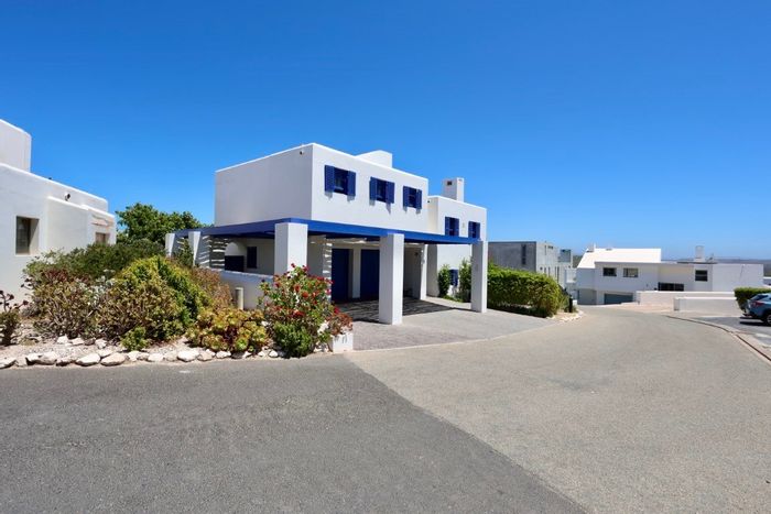 House for Sale in Paradise Beach: Private beach access, sea views, AirBnB potential.