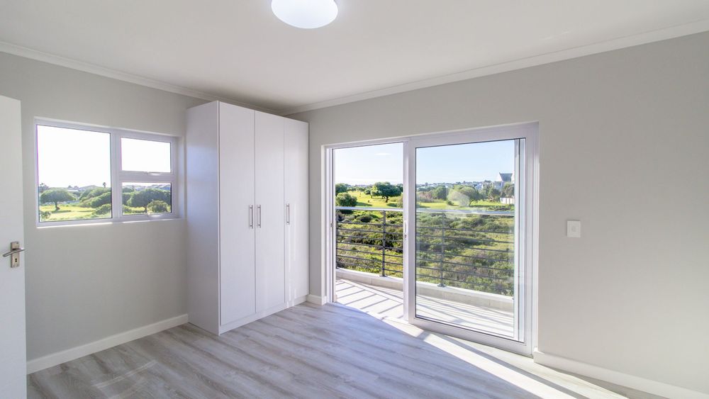 2ND BEDROOM SHARING THE BALCONY WITH MAIN BEDROOM OVERLOOKING THE MASHIE COURT- PEACEFUL, TRANQUIL SURROUNDINGS