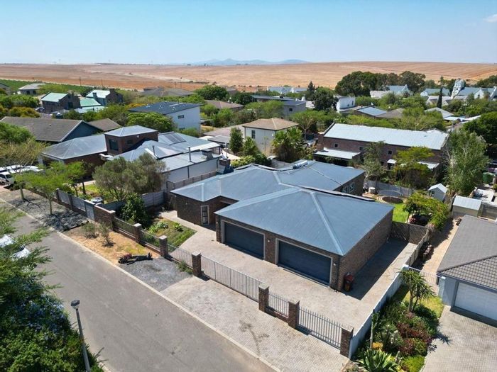For Sale: Off-Grid House in Philadelphia with solar power, water independence, and entertainment features.