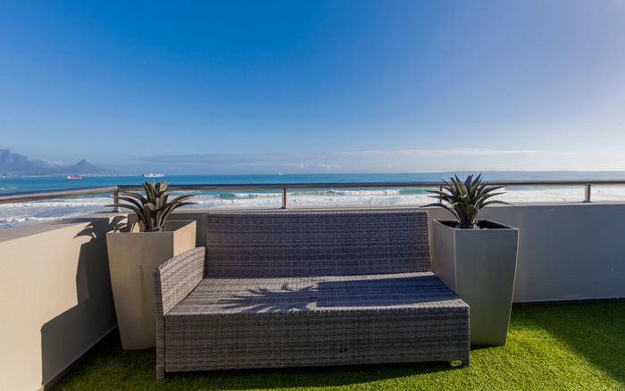 For Sale: 2-Bedroom Apartment in Bloubergstrand with Beach Access and Pool.