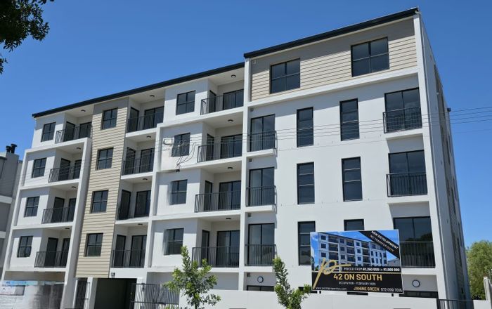 For Sale: Apartment in Table View with private garden, lift access, and smart security.