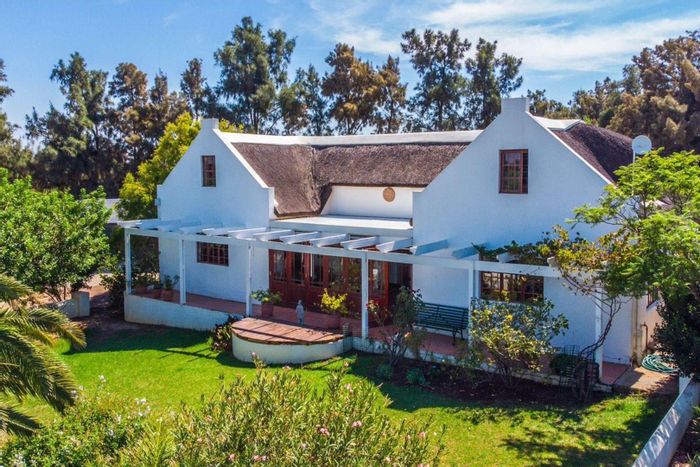 For Sale: Wellington Rural Farm with equestrian facilities, olive grove, and multiple residences.