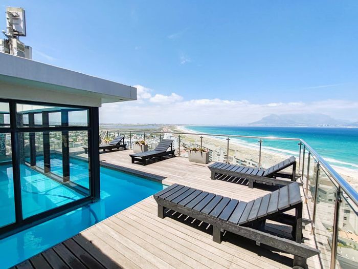 Waves Edge Apartment For Sale: Beachfront, private lift, rental income potential.