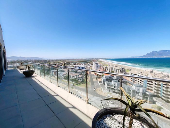 Waves Edge Apartment For Sale: Beachfront, private lift, rooftop pool, gym access.