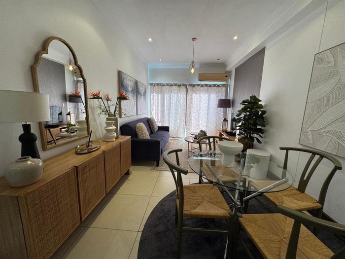 For Sale: Apartment in Umhlanga Central, 2 beds, balcony, near amenities.
