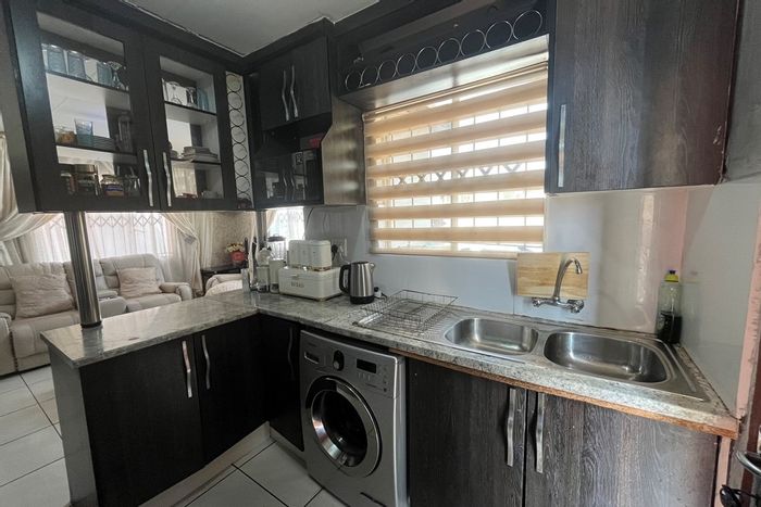 For Sale: House in Blue Hills with secure complex, private garden, and ample parking.